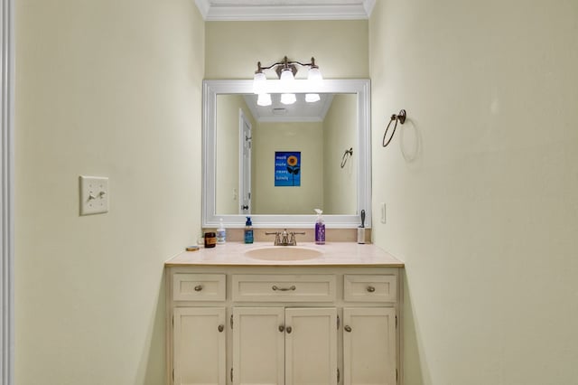 bathroom featuring vanity and crown molding