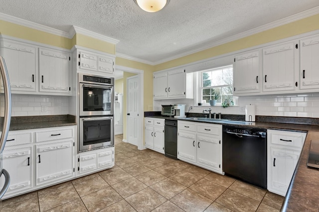 kitchen with dishwasher, dark countertops, a sink, and stainless steel double oven