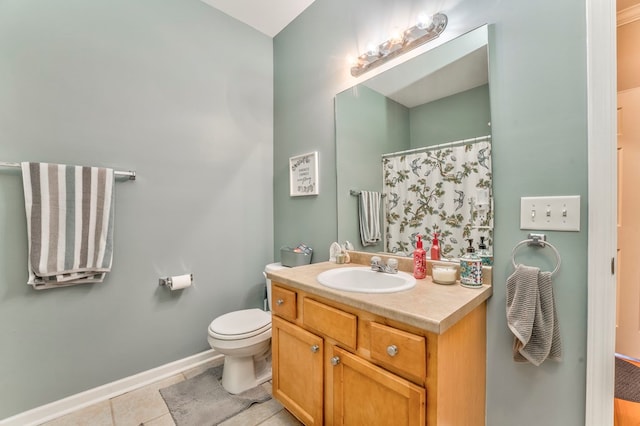 full bathroom featuring tile patterned flooring, baseboards, toilet, a shower with shower curtain, and vanity