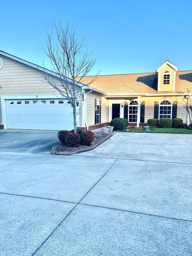 single story home with a garage