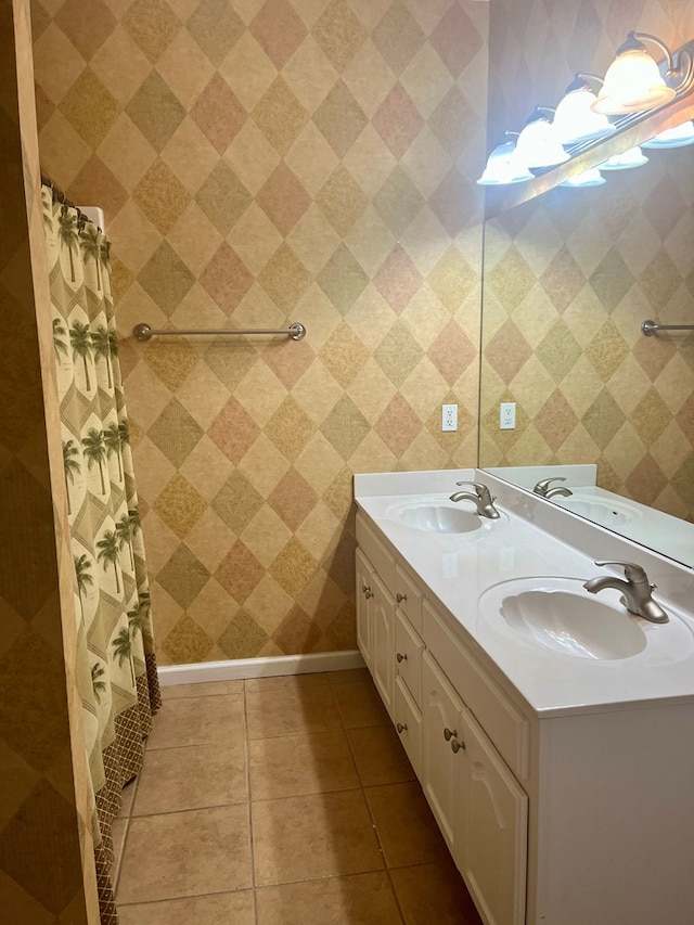 bathroom with vanity and tile patterned flooring