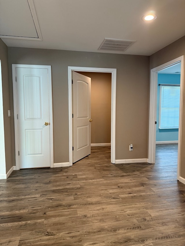 506 Teasley St, Dalton, GA 30721 - unfurnished bedroom featuring baseboards, recessed lighting, and wood finished floors