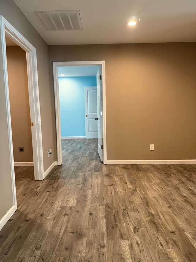 506 Teasley St, Dalton, GA 30721 - hallway featuring wood finished floors, baseboards, and recessed lighting