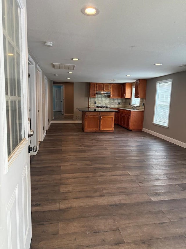 506 Teasley St, Dalton, GA 30721 - kitchen featuring baseboards, brown cabinets, dark wood-style flooring, and recessed lighting