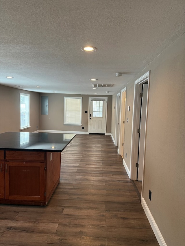 506 Teasley St, Dalton, GA 30721 - kitchen with a textured ceiling, dark wood finished floors, open floor plan, baseboards, and recessed lighting