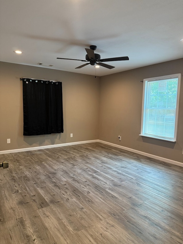 506 Teasley St, Dalton, GA 30721 - spare room with wood finished floors, a ceiling fan, baseboards, and recessed lighting