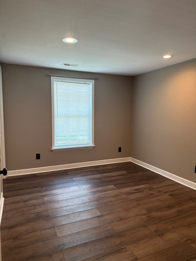 506 Teasley St, Dalton, GA 30721 - spare room with recessed lighting, dark wood-style flooring, and baseboards