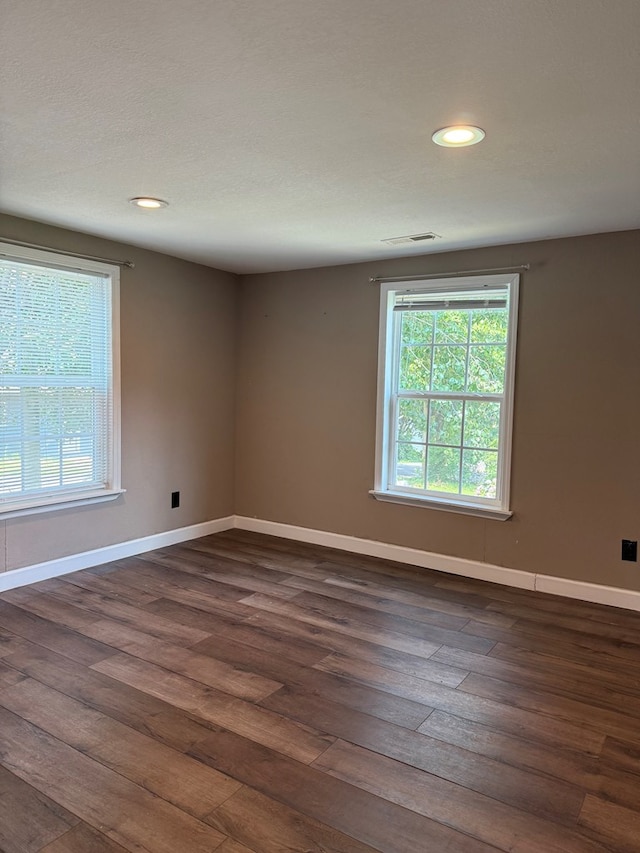 506 Teasley St, Dalton, GA 30721 - empty room with dark wood-style flooring, baseboards, and recessed lighting