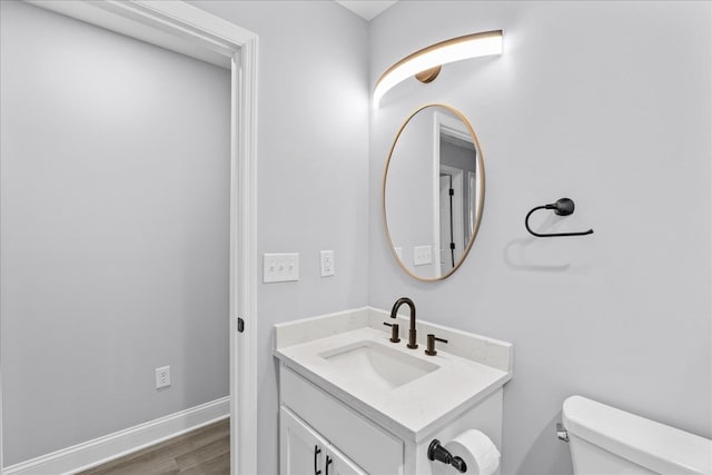 638 Pine Oaks Dr, Tunnel Hill, GA 30755 - bathroom with wood finished floors and vanity