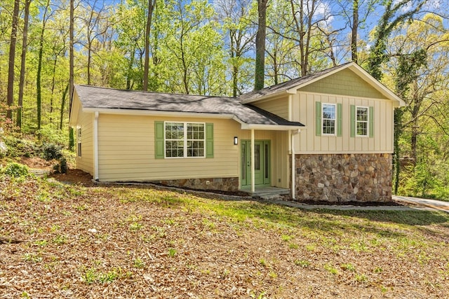 638 Pine Oaks Dr, Tunnel Hill, GA 30755 - split level home featuring board and batten siding, stone siding, and a shingled roof