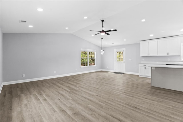 638 Pine Oaks Dr, Tunnel Hill, GA 30755 - unfurnished living room featuring ceiling fan, vaulted ceiling, recessed lighting, and light wood-style flooring