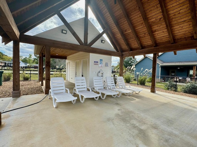 view of patio / terrace featuring fence