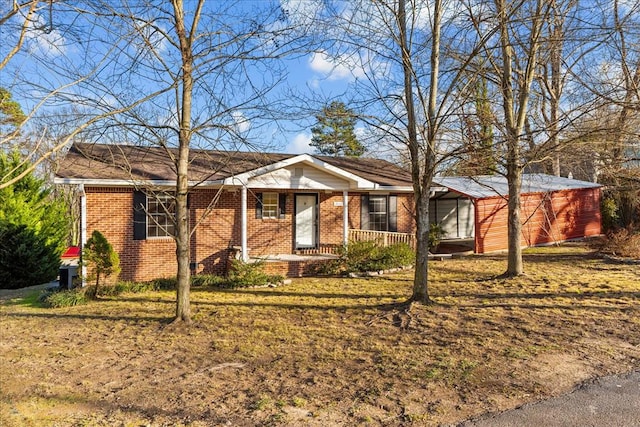 ranch-style home with a porch