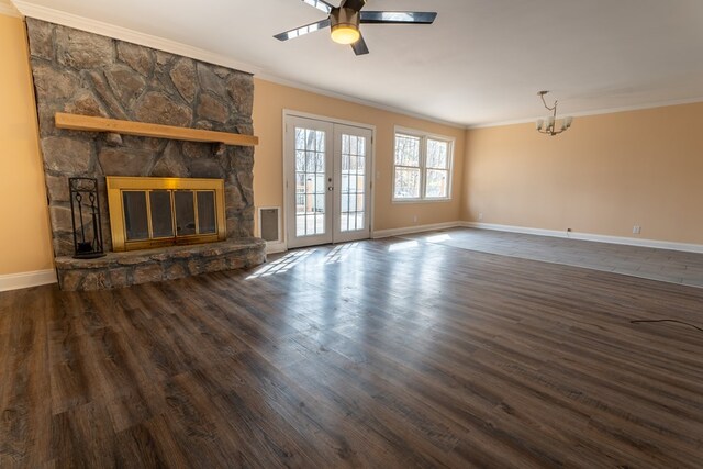 unfurnished living room with wood finished floors, a fireplace, and ornamental molding