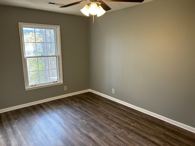 1935 Meadowbrook Cir Unit C, Dalton, GA 30720 - unfurnished room with baseboards, dark wood finished floors, a textured ceiling, visible vents, and a ceiling fan