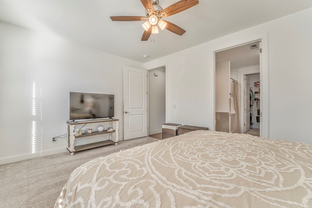 bedroom with ceiling fan and carpet flooring