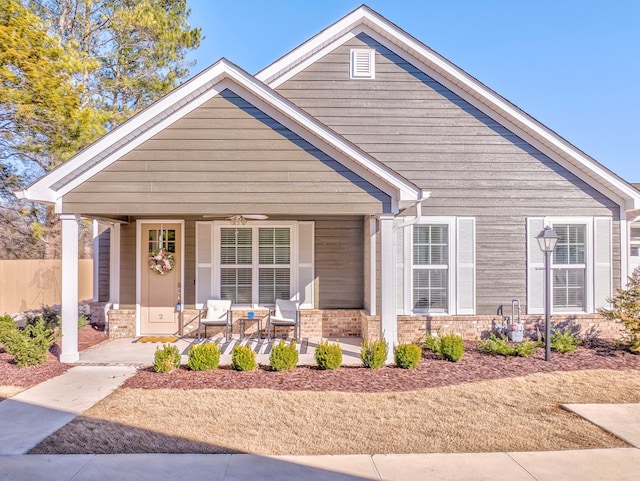 view of front of home featuring covered porch and ceiling fan