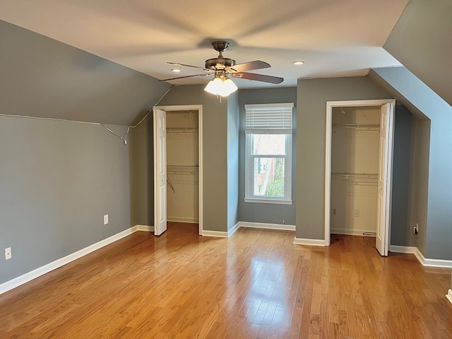 bonus room featuring ceiling fan, lofted ceiling, and light hardwood / wood-style floors