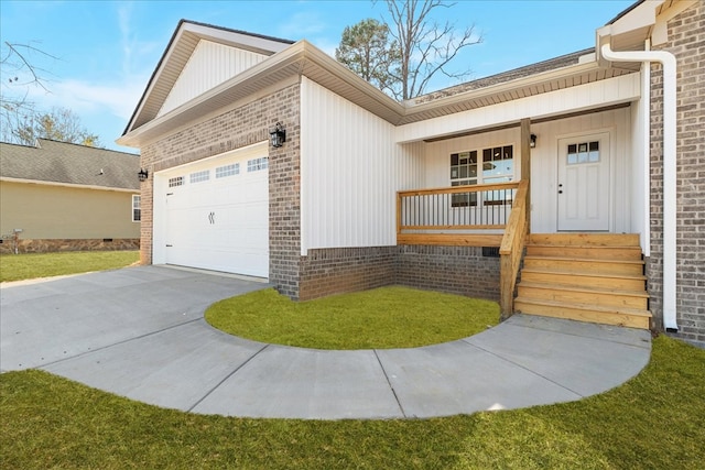 ranch-style house featuring brick siding, driveway, a garage, and covered porch