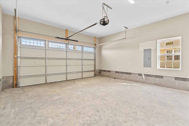 garage featuring a garage door opener and electric panel
