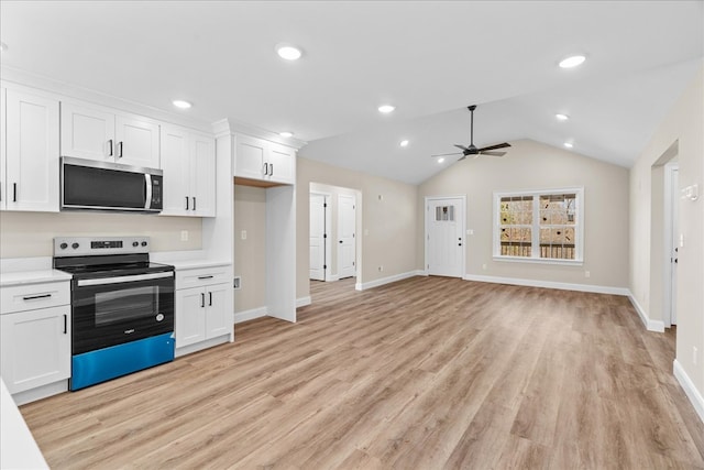 kitchen with a ceiling fan, light wood-style floors, stainless steel appliances, light countertops, and white cabinets
