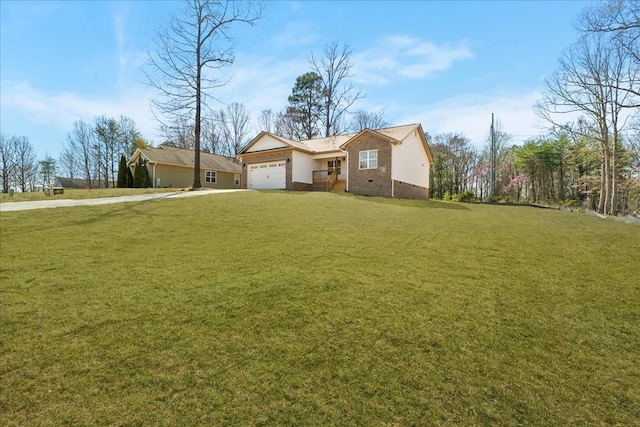 ranch-style house featuring a garage, crawl space, a front yard, and concrete driveway