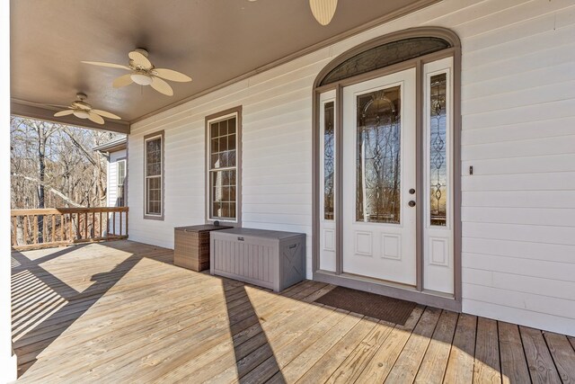 wooden deck with ceiling fan