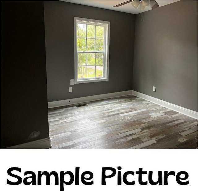 LOT4 River Bend Rd, Dalton, GA 30721 - empty room featuring a ceiling fan, wood finished floors, and baseboards