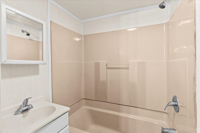 bathroom with vanity and bathing tub / shower combination