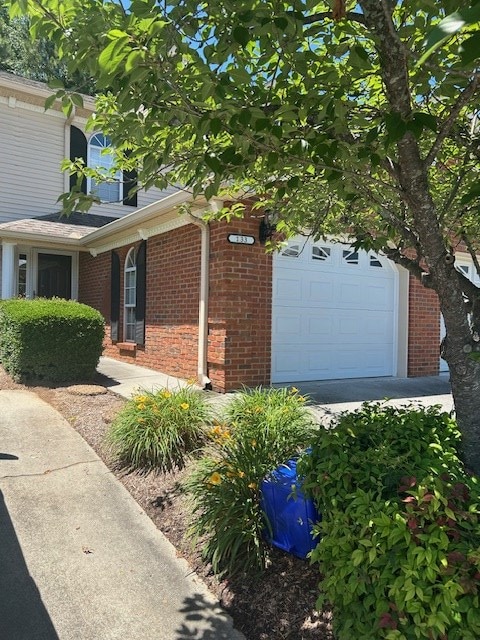 1699 Pin Oak Dr Unit 133, Dalton, GA 30721 - view of side of property with brick siding and a garage