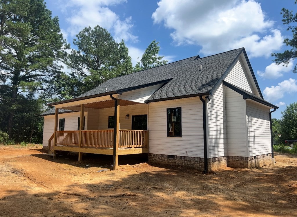 11 Elbert St, Chatsworth, GA 30705 - rear view of house featuring crawl space, a shingled roof, and a deck