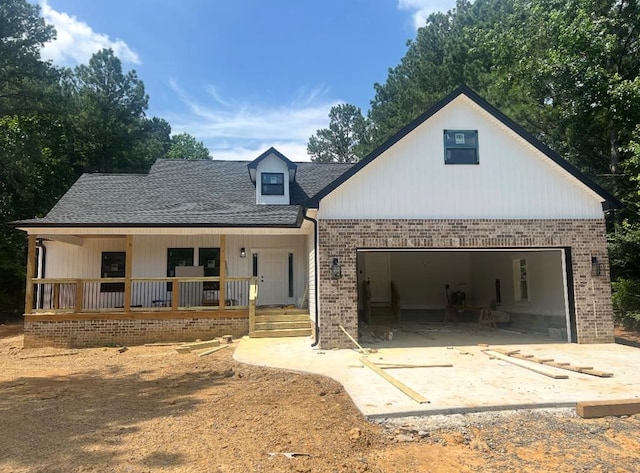 11 Elbert St, Chatsworth, GA 30705 - modern farmhouse style home with brick siding, covered porch, a garage, and a shingled roof