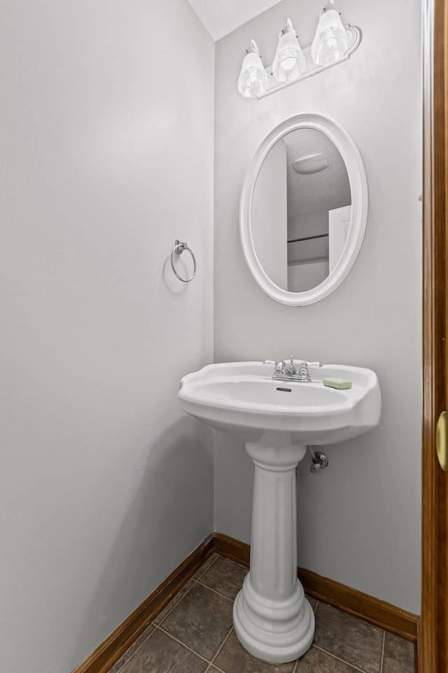 bathroom featuring tile patterned flooring