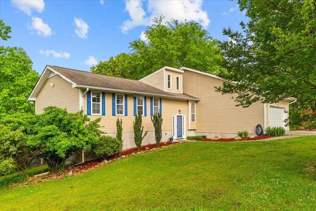 493 Lennox Way, Rocky Face, GA 30740 - split level home with a front lawn and an attached garage