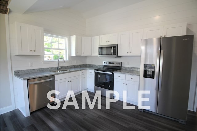LOT5 River Bend Rd, Dalton, GA 30721 - kitchen featuring stainless steel appliances, dark wood finished floors, white cabinets, vaulted ceiling, and light stone counters