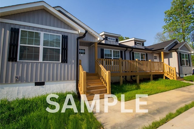 LOT5 River Bend Rd, Dalton, GA 30721 - view of front facade with crawl space, board and batten siding, and a wooden deck