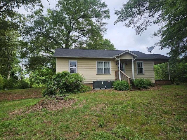3165 Mcdaniel Station Rd, Adairsville, GA 30103 - view of front of house featuring central air condition unit and a front yard