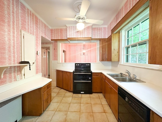705 Greenwood Dr, Dalton, GA 30720 - kitchen with brown cabinetry, a sink, light countertops, black appliances, and wallpapered walls