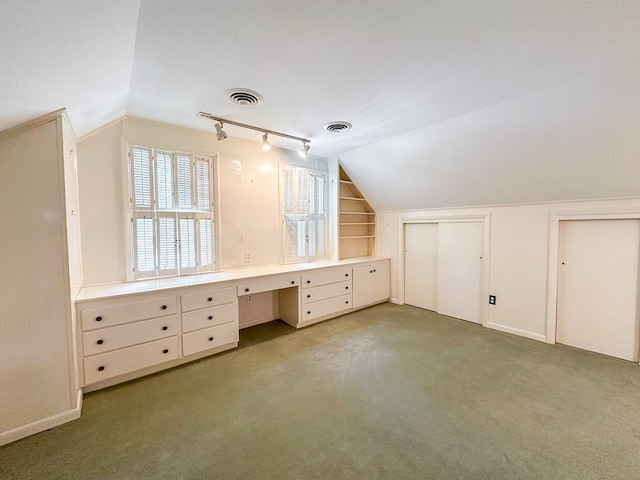 705 Greenwood Dr, Dalton, GA 30720 - bonus room with visible vents, lofted ceiling, built in study area, baseboards, and carpet flooring