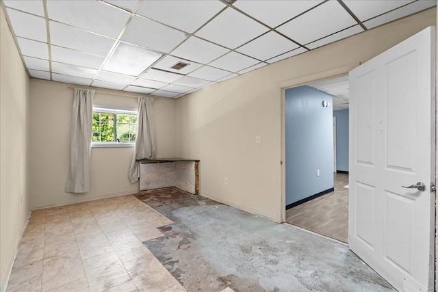 843 Mcafee St, Dalton, GA 30721 - unfurnished room featuring baseboards, a paneled ceiling, and visible vents