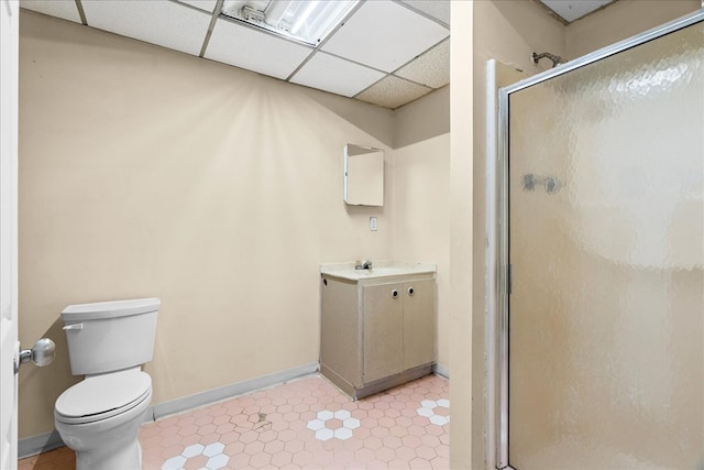 843 Mcafee St, Dalton, GA 30721 - full bathroom featuring toilet, a drop ceiling, baseboards, a shower stall, and vanity
