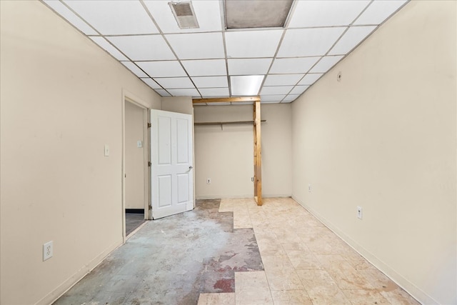 843 Mcafee St, Dalton, GA 30721 - unfurnished bedroom with visible vents and a paneled ceiling