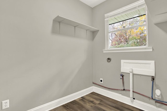 washroom with washer hookup, dark wood-type flooring, and electric dryer hookup