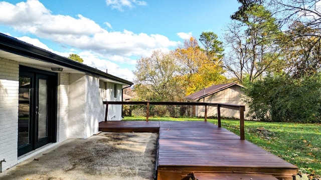 wooden deck with a yard