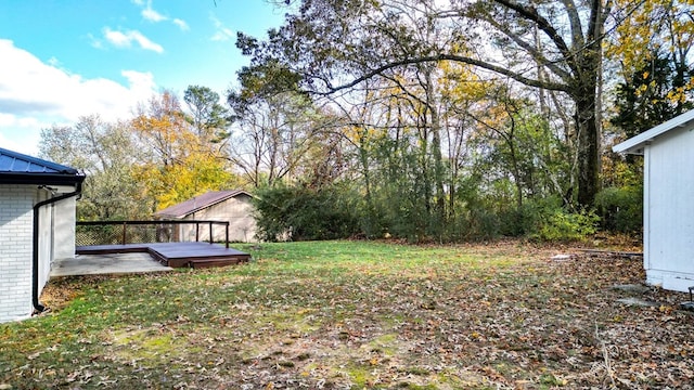 view of yard with a deck