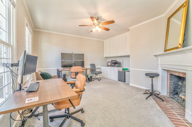 carpeted office with ornamental molding and ceiling fan