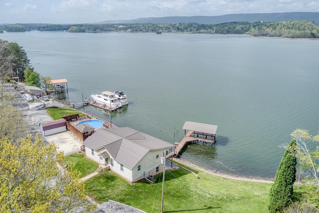 drone / aerial view with a water view