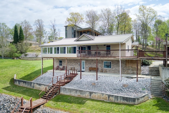 back of house with a lawn, stairway, a patio area, and a deck