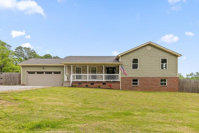 5742 Keith Rd, Ringgold, GA 30736 - split level home with fence, covered porch, gravel driveway, crawl space, and an attached garage