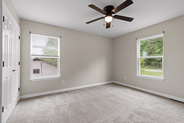 5742 Keith Rd, Ringgold, GA 30736 - empty room with baseboards, plenty of natural light, carpet flooring, and visible vents